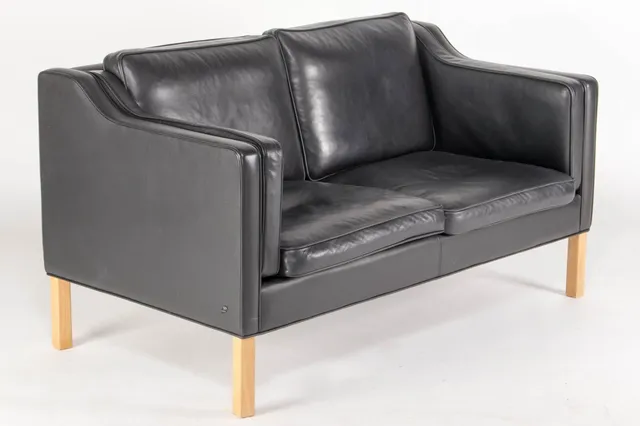 Hurup Furniture Factory. Two-person sofa upholstered in black leather
