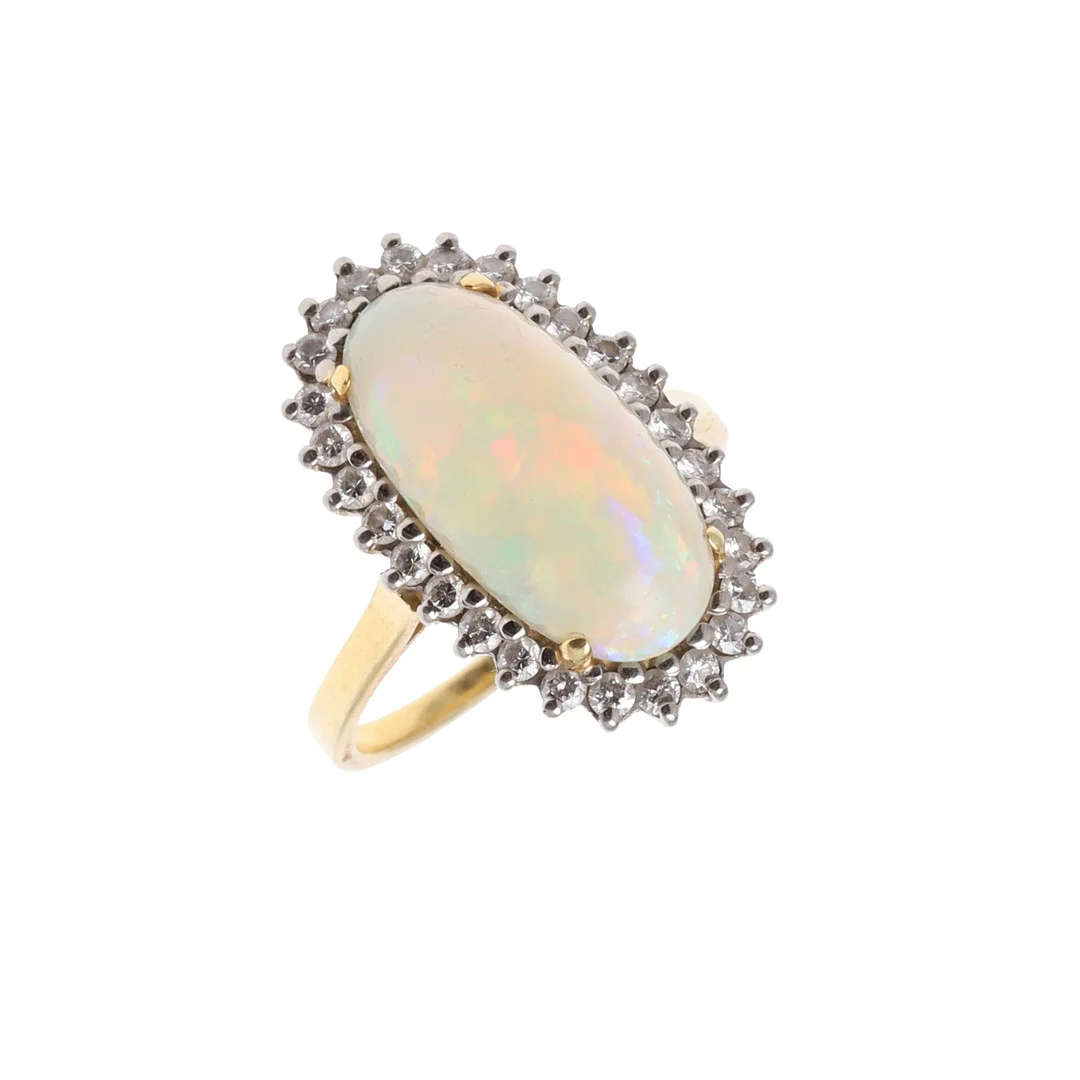AN OPAL AND DIAMOND CLUSTER RING. — Rings — Lawrences Auctioneers