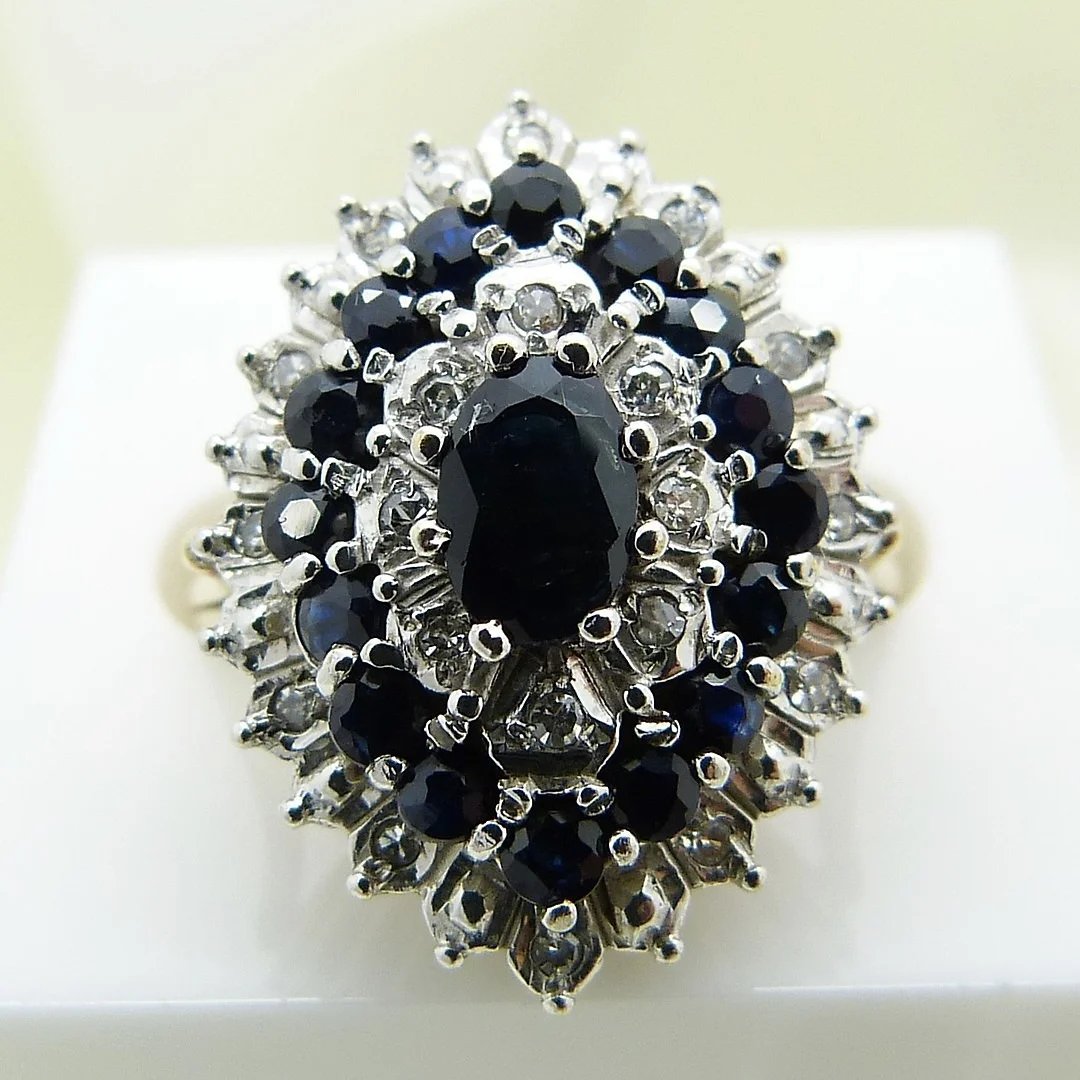 SAPPHIRE & DIAMOND CLUSTER RING. — Rings — Rumsey’s Auctioneers