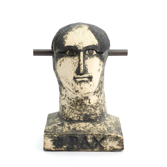 “Pax”. Unsigned. Stoneware bust with a patinated and massive bronze stick. H. 36 cm.