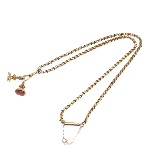 A 9CT GOLD CHAIN NECKLACE AND FOB SEALS.