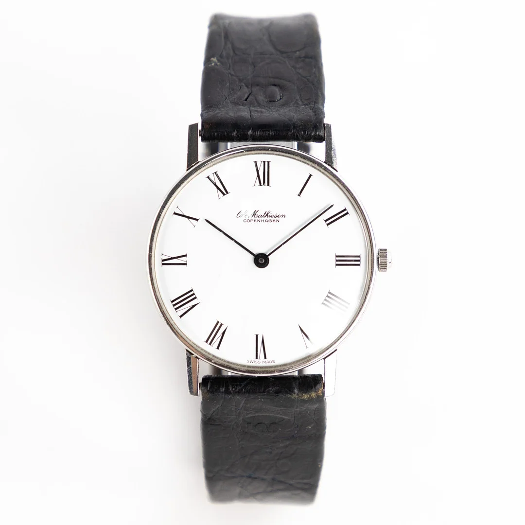 OLE MATHIESEN. 33 mm, rostfritt stål, ca 1980-tal. — Wristwatches — Karljohan Auktioner