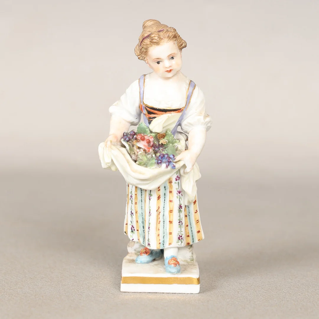 A 18TH / 19TH CENTURY MEISSEN FIGURE OF A YOUNG GIRL. — European — Bishop & Miller