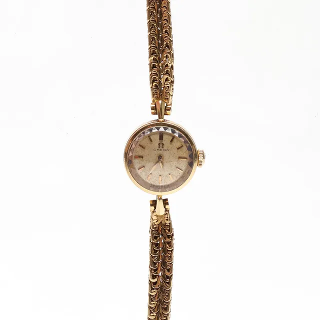 DAMARBANDSUR, manuell. Omega, 18K guld i boett och armband. totalvikt ca 24gram.