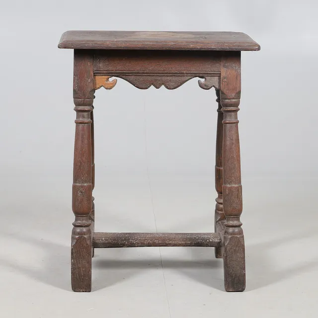 A RARE 17TH CENTURY OAK & ELM JOINT STOOL.