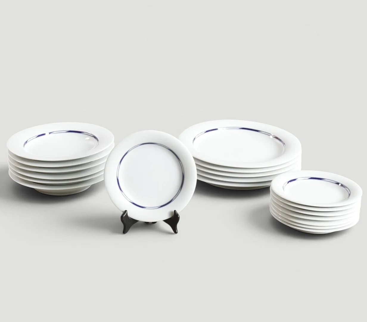 ALEV EBÜZZIYA SIESBYE (F. ISTANBUL 1938). "Sirius", stel af hvidt porcelæn med blå kant. Udført for Royal Copenhagen, Danmark (19). — European — Woxholt Auktioner