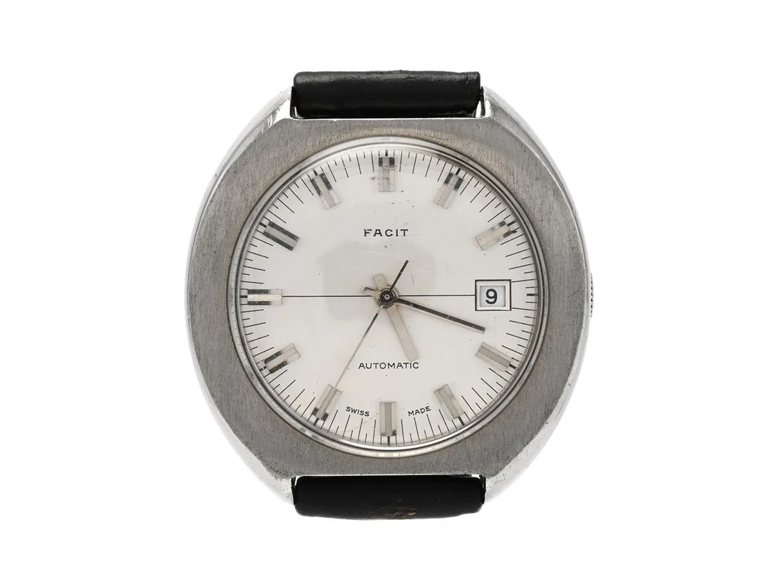 FACIT, herrur, 39 mm, Cal ETA 2783, Boett nr. 89131, stål, automatisk, plexiglas, datum, skadad urtavla, servicebehov, läderband, ca 1970. — Klockor/Facit — Kaplans