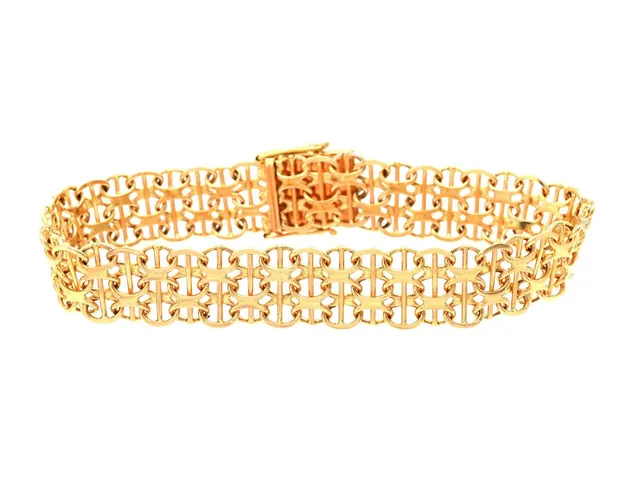 ARMBAND, 18K guld, X-länk med stav, längd 19,5 cm, vikt 22,2 g.