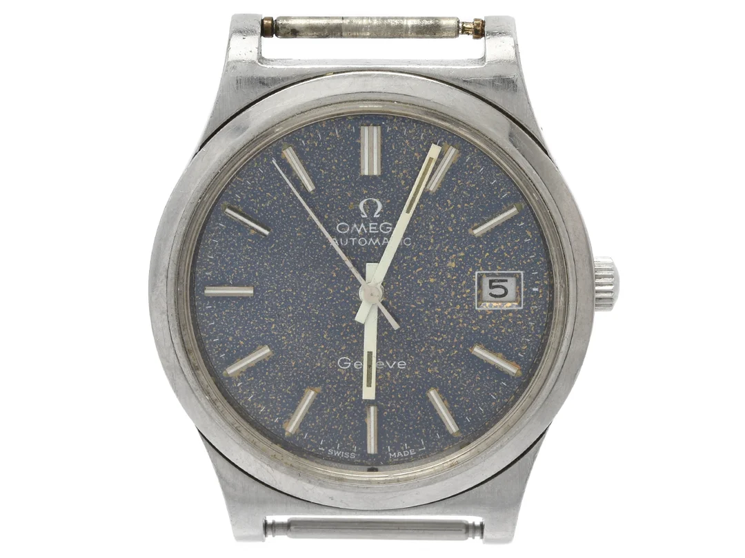 OMEGA, Genève, Cal 1012, Serie nr. 37811553, Ref nr. ST 166.0168, Boett nr. 166.0168, herrur, 36 mm, stål, automatisk, plexiglas, datum, skadad urtavla, defekt, 1 st. verkhållare saknas, ca 1973. — Klockor/Omega — Kaplans