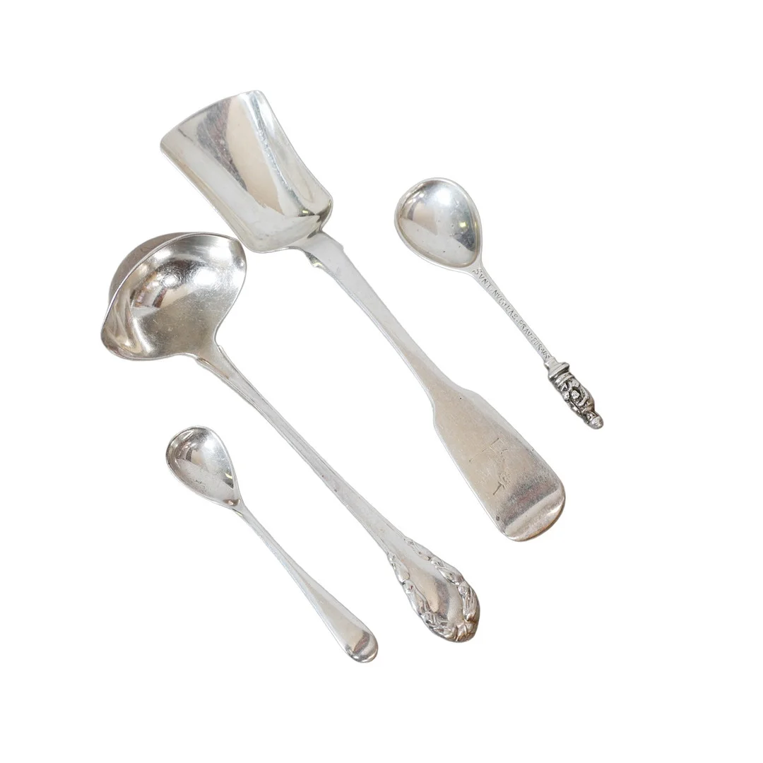 A GEORG JENSEN SILVER SAUCE LADLE, A VICTORIAN IRISH SILVER PRESERVE SPOON, TWO SILVER CONDIMENT SPOONS (4). — Silver — Bishop & Miller