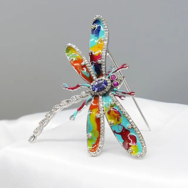 TANZANITE, DIAMOND & ENAMEL brooch.
