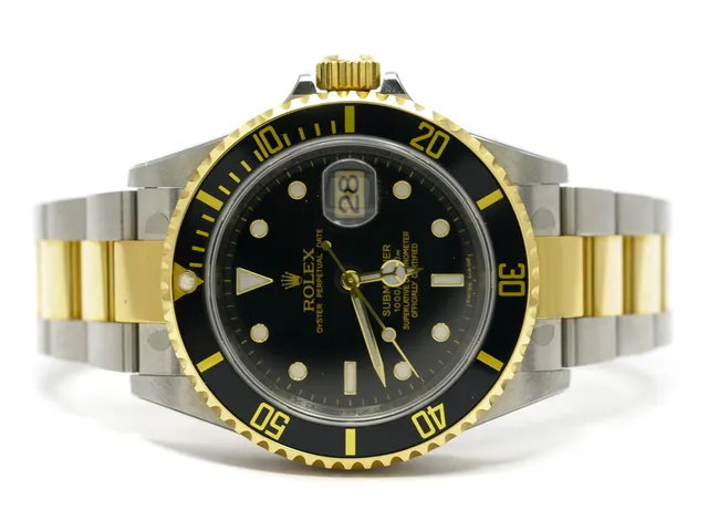 ROLEX, Oyster Perpetual Date, Submariner (1000ft=300m), Chronometer, Ref nr. 16613 LN, Serie nr. M474779, Cal 3135, Verk nr. 3 2127313, Boett nr. 2160, herrur, 40 mm, stål/guld, automatisk, safirglas, datum, Fliplocklänk, viklås, Ref nr. 93253-PJ3/EO, cert, juni 2009, box, ytterkartong.