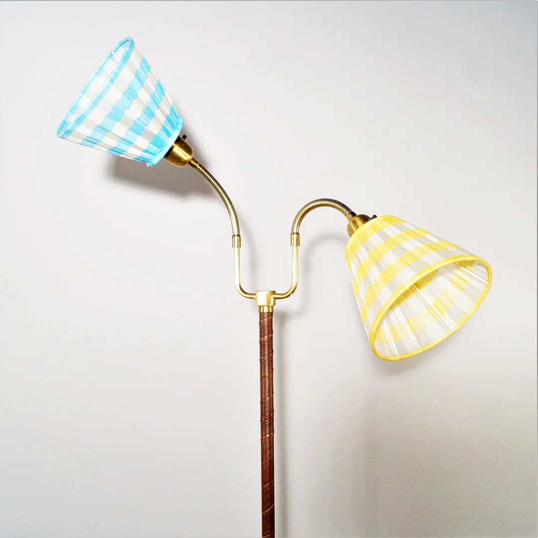 EINAR BÄCKSTRÖM. golvlampa, tvåarmad. — Floor lights — Lysekils Auktionsbyrå