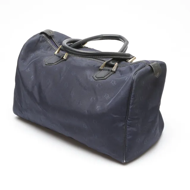 CHRISTIAN DIOR. Väska, Monogrammönstrad nylontextil och skinn, Christian Dior bagages, Paris, Made in France, 1970/80-tal.
