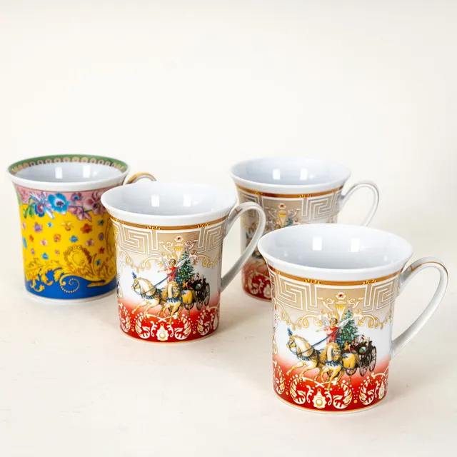 VERSACE. Vier Becher Chrismas Chariot Kollektion und ´Primavera` für Rosenthal, 2005 und 2007 (4).