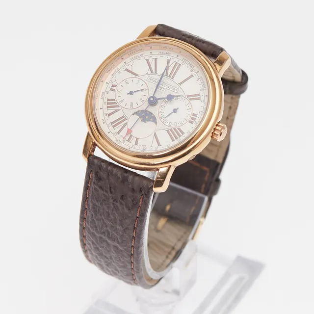 FREDERIQUE CONSTANT. Armbanduhr, Quarz, Edelstahl vergoldet, Leder, Schweiz.