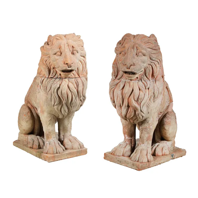A PAIR OF LARGE TERRACOTTA LIONS, EARLY 20TH CENTURY (2).