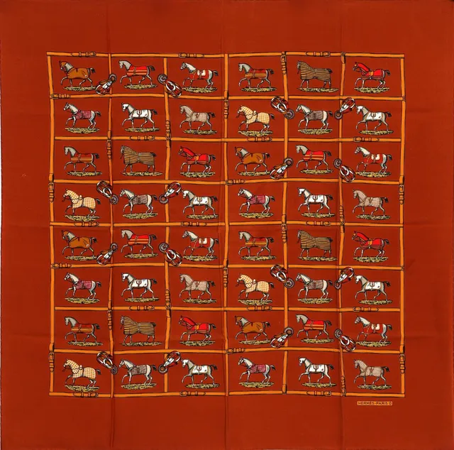 A silk scarf with motif “Couvertures Es Tenues Du Jour” by Jacques Eudel. App. 80×80 cm.