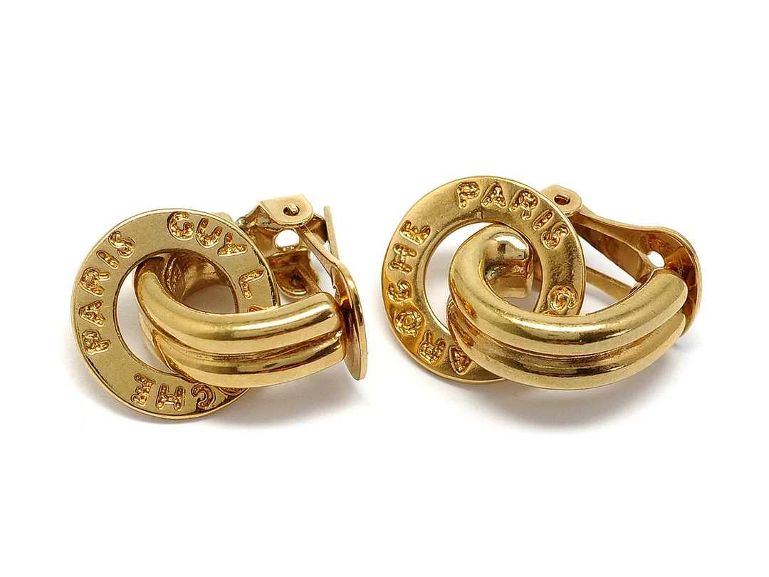 ÖRHÄNGEN, GUY LAROCHE gulmetall clips 3 cm långa — Accessoarer/Övrigt — Kaplans