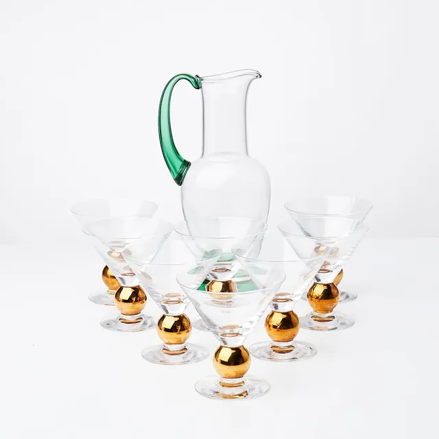 GUNNAR CYRÉN. SERVISGLAS,(9)“Nobel“, Orrefors, 8 champagneglas samt 1 tillbringare.