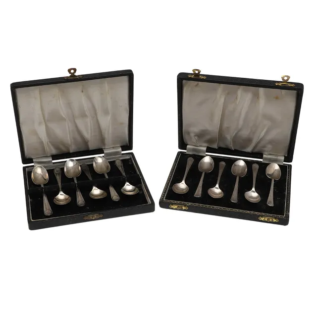 TWO CASED SETS OF SILVER TEA/COFFEE SPOONS.