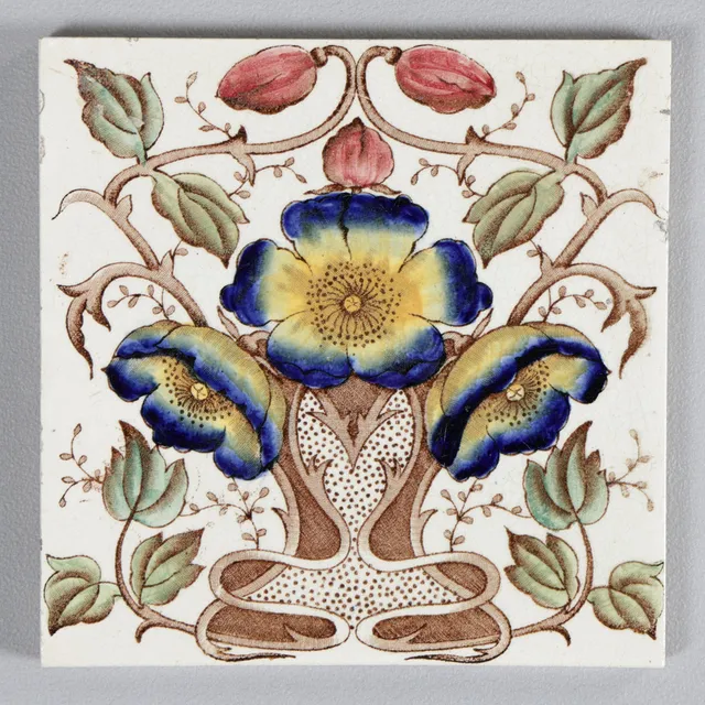 A DECORATIVE VICTORIAN TILE, IN THE STYLE OF WILLIAM DE MORGAN.