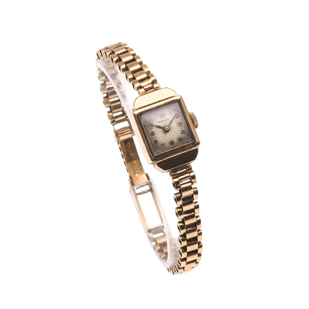 A LADY'S 9CT GOLD WRISTWATCH BY MARVIN. — Wristwatches — Lawrences Auctioneers