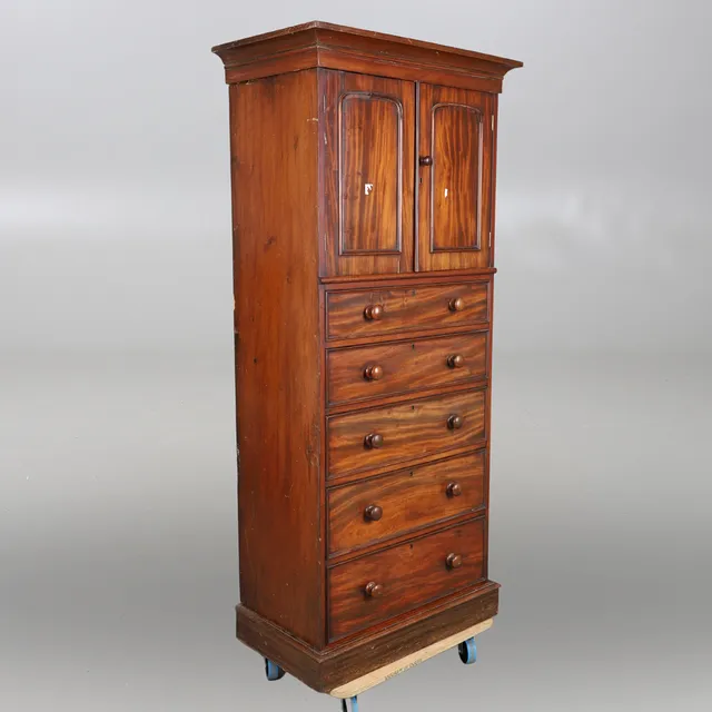 A VICTORIAN MAHOGANY CUPBOARD CHEST.