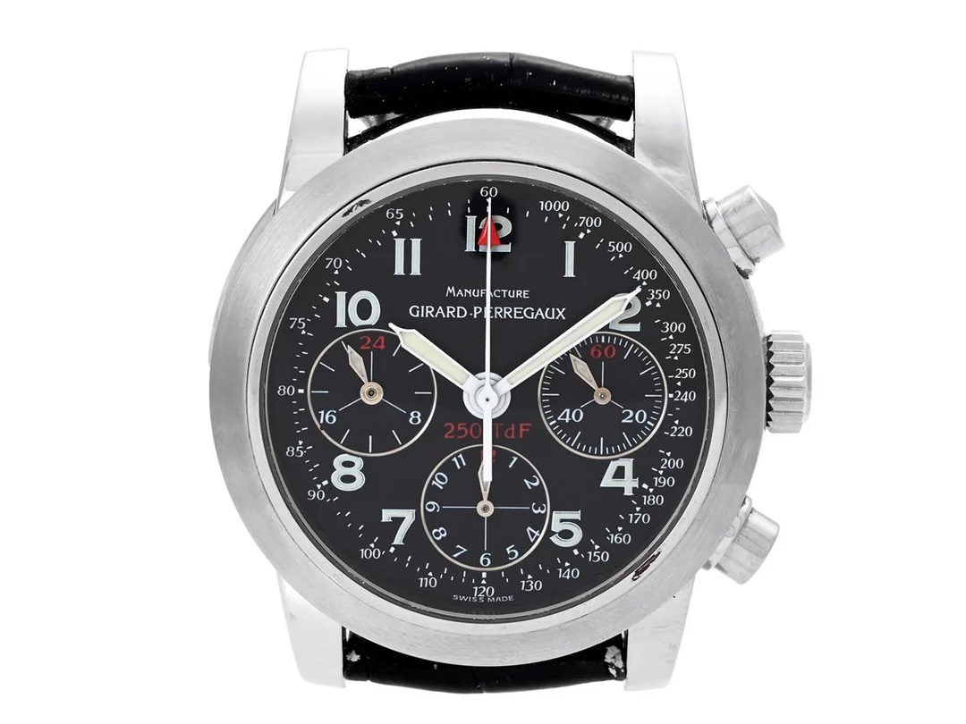 GIRARD-PERREGAUX, Ferrari, "250 GT TDF", Cal 2280U-781, Serie nr. 1677, Ref nr. 8090, kronograf, herrur, 38 mm, stål, automatisk, safirglas, 24h-visning, läderband, originalspänne, ca 1998, box (skadad), ytterkartong. Limiterad men ej numrerad (En av 2000). — Klockor/Girard-Perregaux — Kaplans