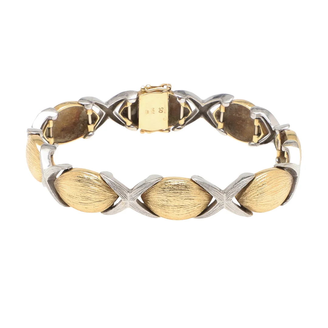 AN 18 CARAT TWO COLOUR GOLD BRACELET. — Bracelets — Lawrences Auctioneers