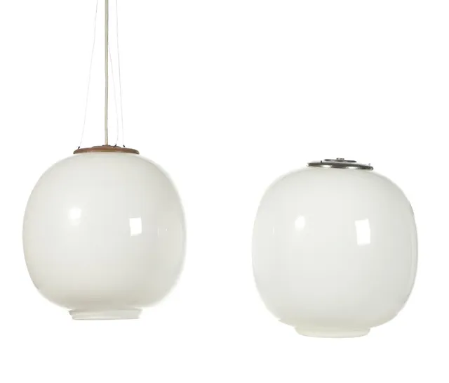 Vilhelm Lauritzen: “Radiohuspendel”. A pair og opaline glass pendants with nickled metal mounting for wire hanging. (2)