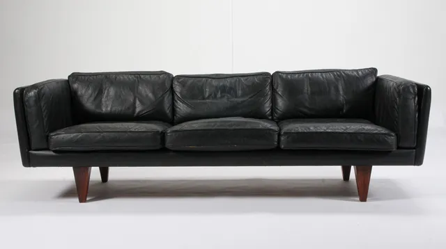 Illum Wikkelsø. Three-person free-standing sofa, model V11. rosewood / aniline leather / rosewood. The 1960s