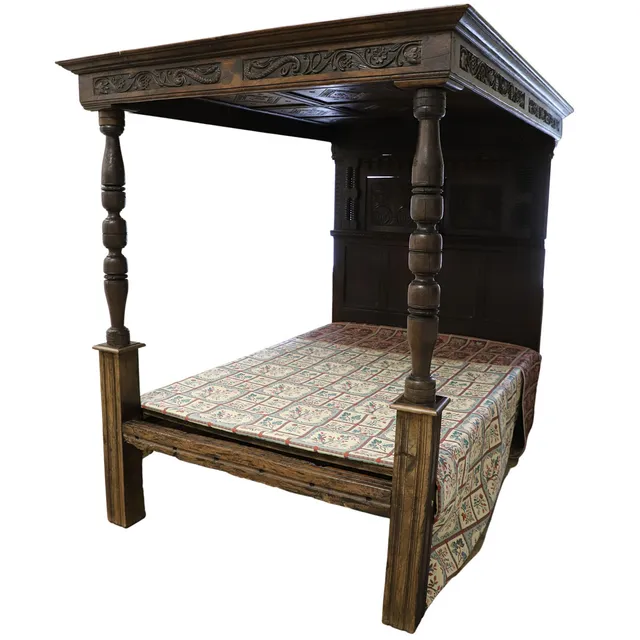 A 17TH CENTURY AND LATER OAK FOUR POSTER BED.