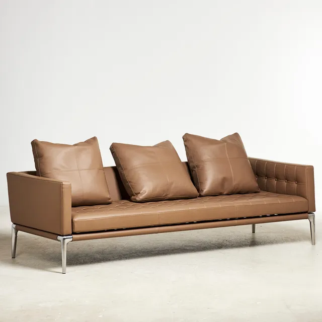 PHILIPPE STARCK. "Volage", soffa, för Cassina, Italien, 3-sitsig modell, djuphäftad läderklädsel med lösa ryggplymåer.