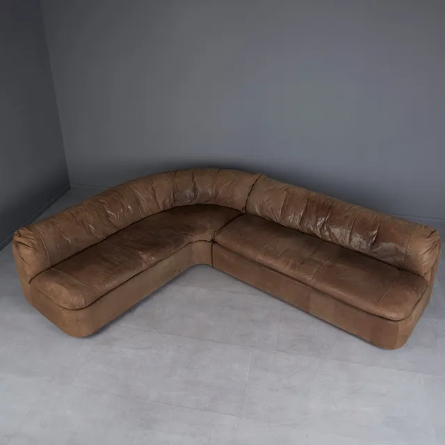 HANS KAUFELD. Zweiteilige Eckcouch / Modulsofa , Leder, 1970er Jahre (2).