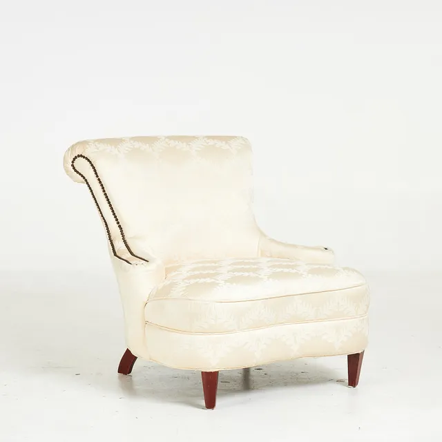 FÅTÖLJ, klädd i nithäftad textil, 1900-tal.
