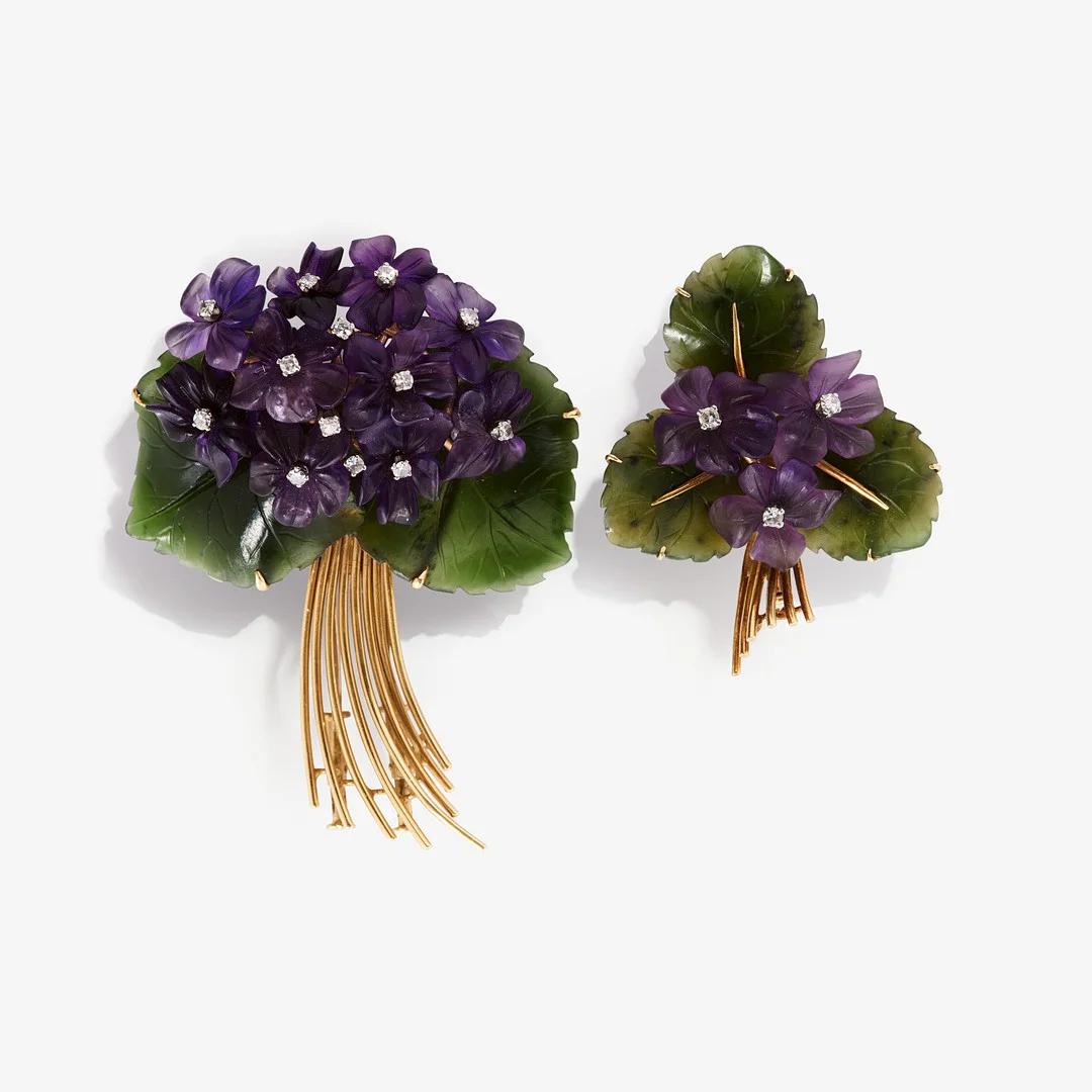 Two gold, amethyst, nephrite and diamond brooches, 1950s. — Brooches & Pendants — Stockholms Auktionsverk Fine Art