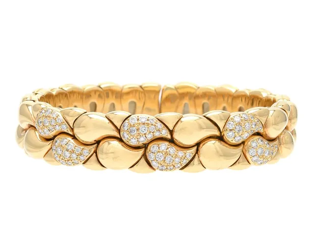CHOPARD, armband, Casmir, 18K guld, 84 briljantslipade diamanter ca 1,26 ctv, ca TW/VVS, mått 54x45 mm, vikt 80,2 g, påse.