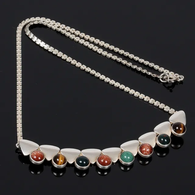 (5-18-13) COLLIER, silver, med bl.a. tigeröga, "Persö" G.H. Bergström, Hedbergs Guld, Stockholm. 1963.