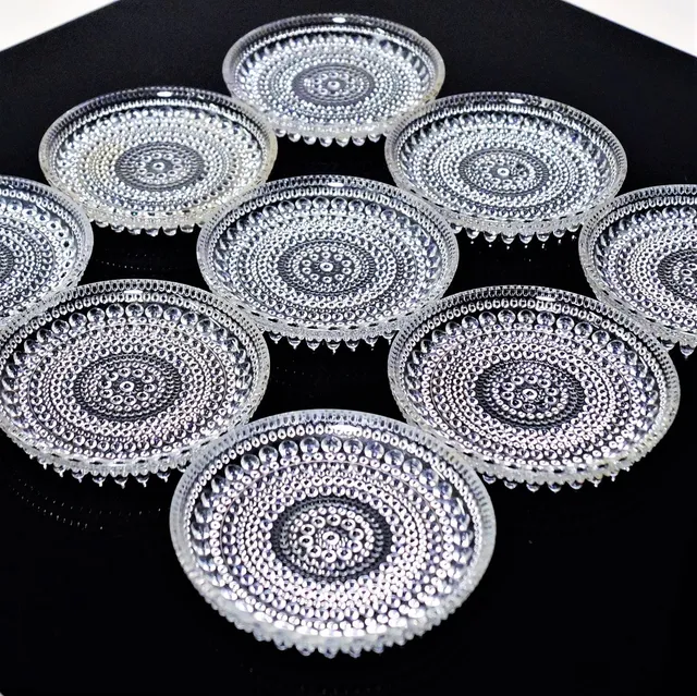 OIVA TOIKKA. glasunderlägg, 9 st, Kastehelmi, Iittala, Finland.