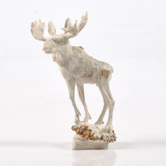 ERIK NORBERG. Skulptur, älg, horn/ben, monogramsignerad och daterad -86.