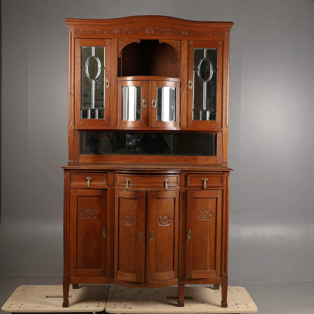 A LARGE ART NOUVEAU OAK CUPBOARD. — Cupboards, Cabinets & Shelves — Bishop & Miller