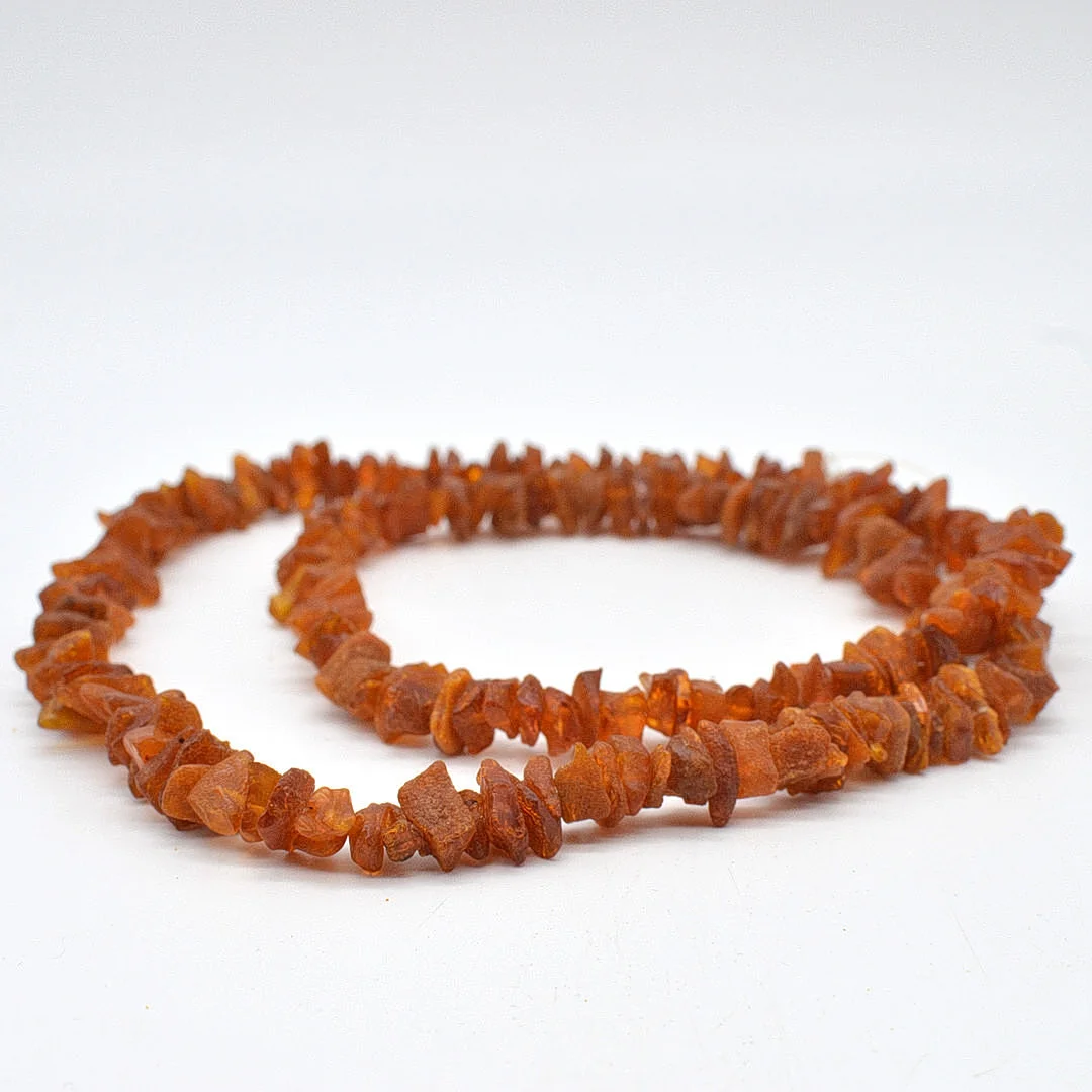 BERNSTEIN COLLIER, NATURBELASSEN, CA. 72CM OHNE VERSCHLUSS, EINREIHIG, VINTAGE. — Necklace — Kunst- und Auktionshaus Kleinhenz