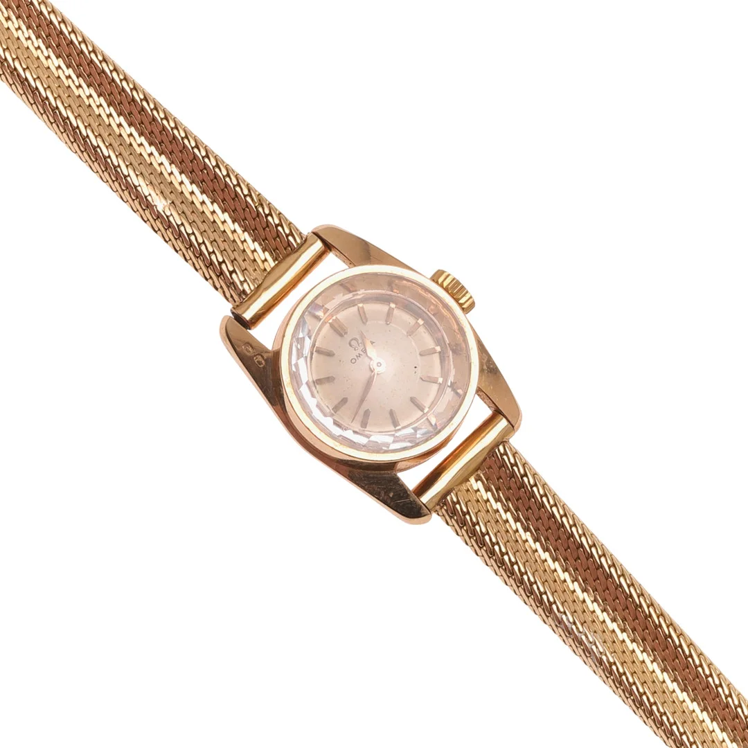 A LADY'S GOLD WRISTWATCH BY OMEGA. — Wristwatches — Lawrences Auctioneers