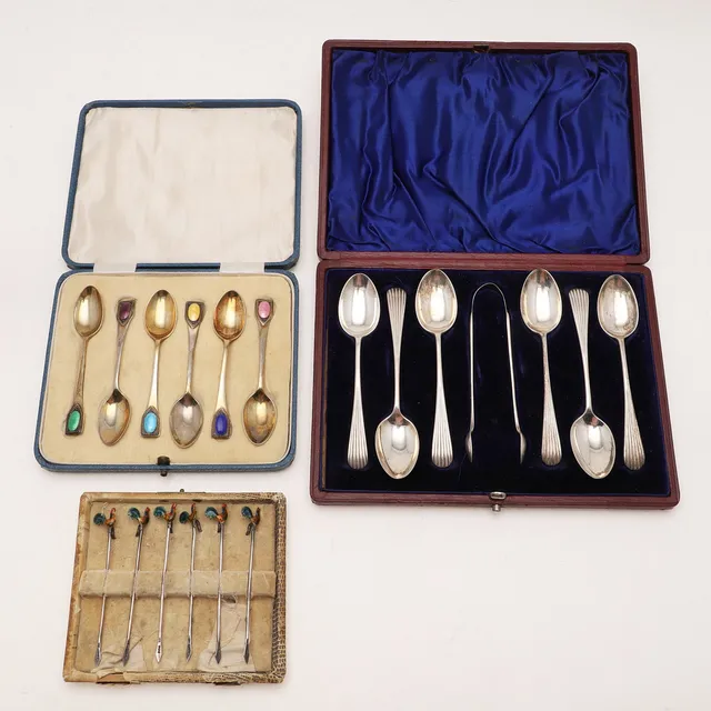 THREE CASED SETS.