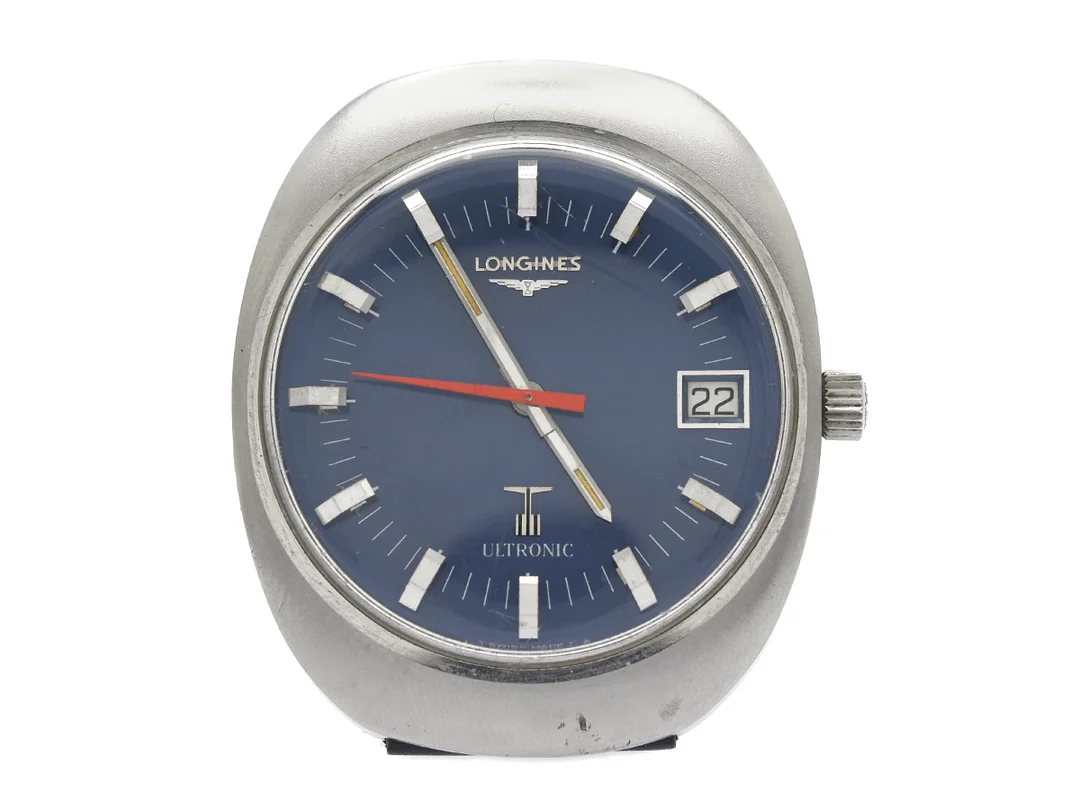 LONGINES, Ultronic, Cal 6312 (ESA 9162), Serie nr. 51004645, Boett nr. 16095398/8616 1, herrur, 36,5 x 44 mm, stål, stämgaffel, plexiglas, datum, skadad urtavla, läderband, ca 1975. — Klockor/Longines — Kaplans