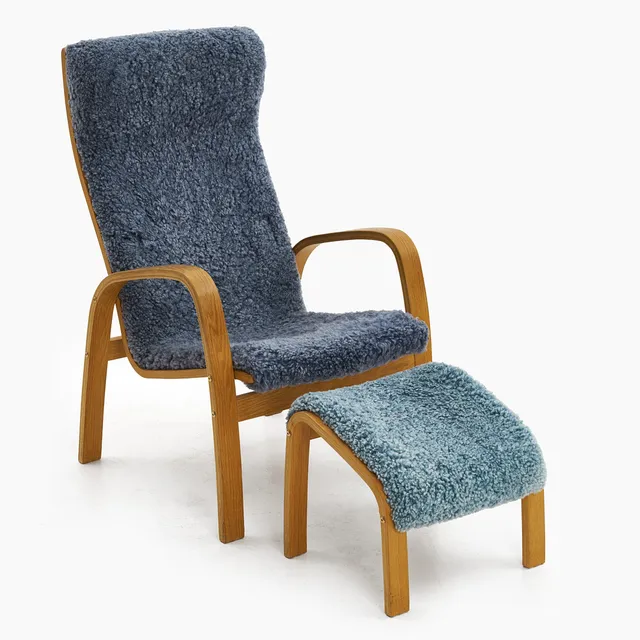 FÅTÖLJ med FOTPALL, 2000-tal, klädsel i fårull.