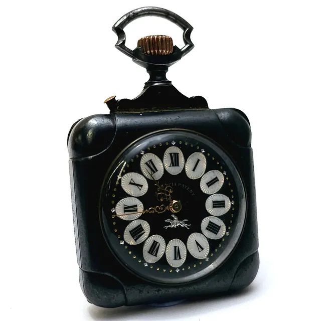 HELVECIA PATENT. RELOJ DE VIAJE EN METAL PAVONADO.