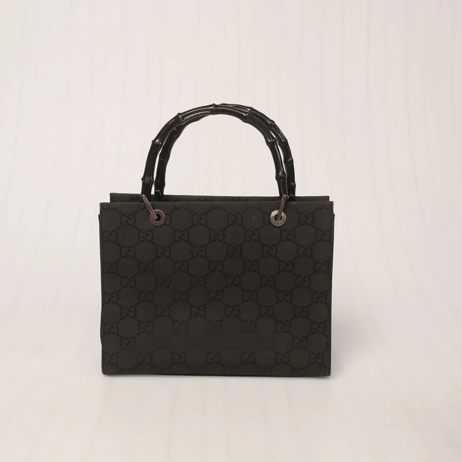 GUCCI, väska, monogramcanvas med bärhandtag i bambu, Italien. — Vintage & Designer Fashion — Limhamns Auktionsbyrå
