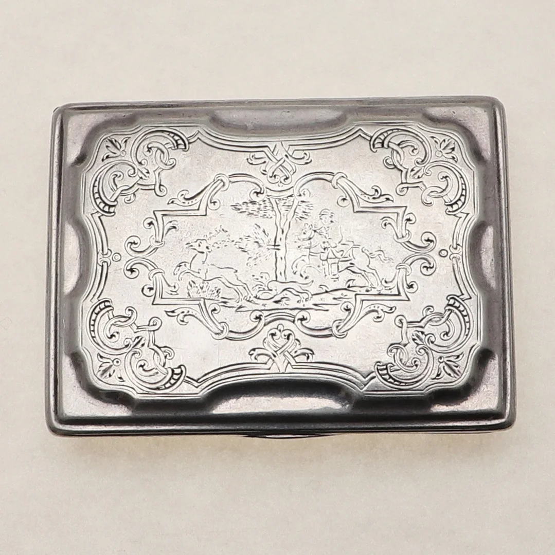 A CONTINENTAL RECTANGULAR SNUFF BOX. — Silver — Lawrences Auctioneers